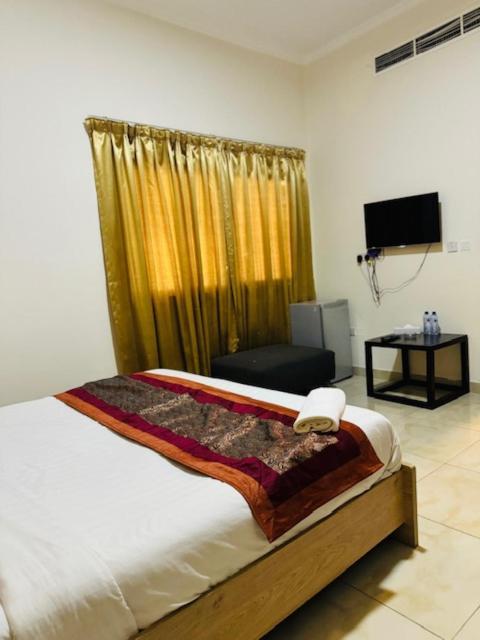 Al Hayat Suites Apartment Manama Luaran gambar